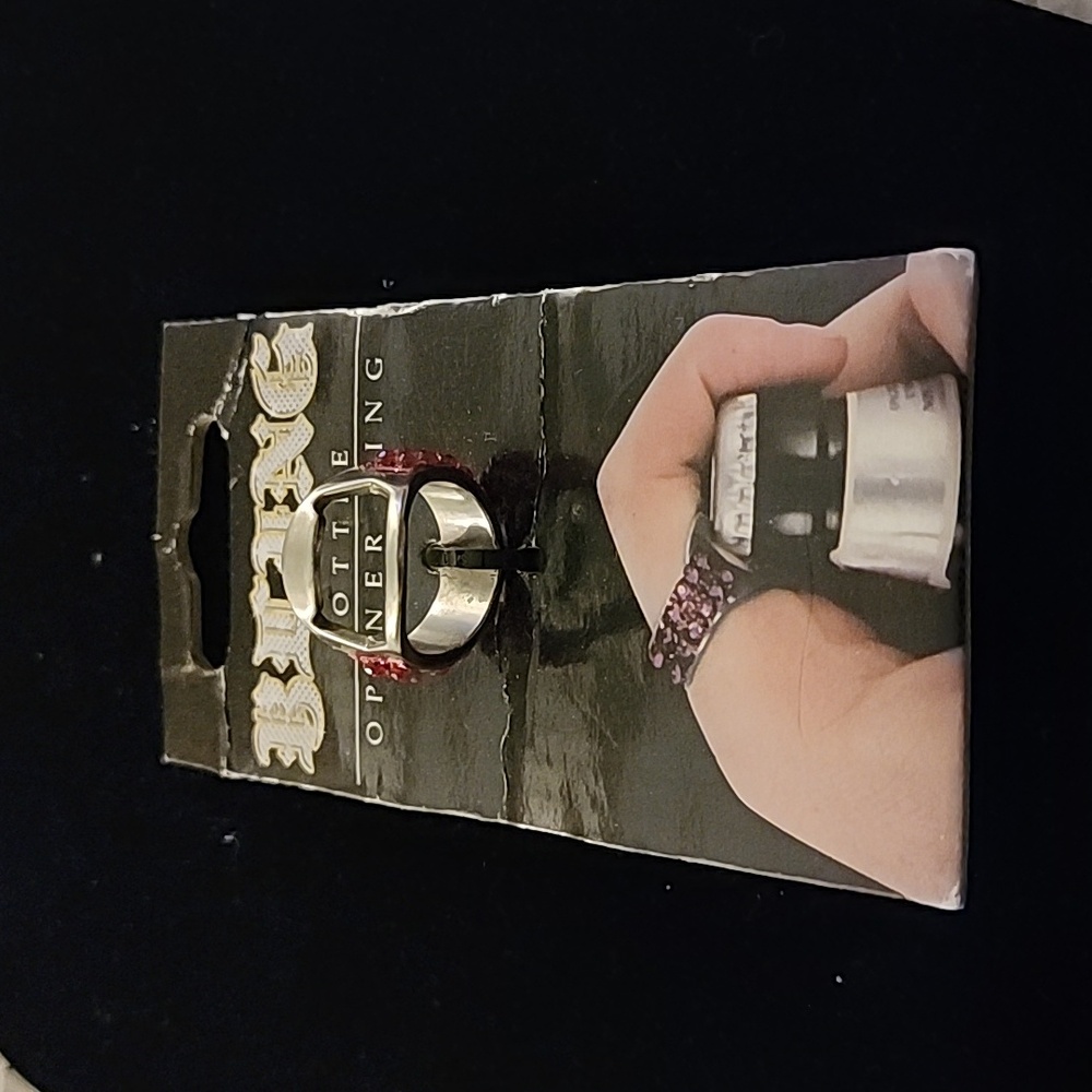 58. BOTTLE OPENER RING